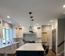 Open-concept Kitchen Remodel with Island and Large Windows in New Jersey